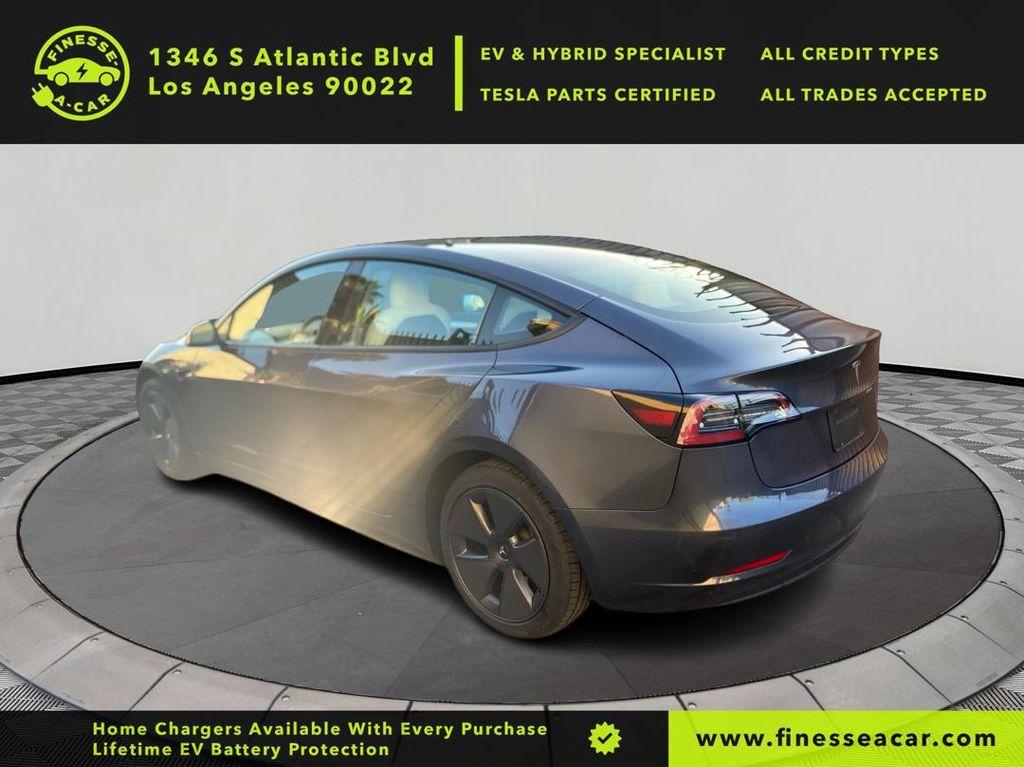 used 2023 Tesla Model 3 car, priced at $22,999