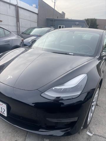 used 2022 Tesla Model 3 car, priced at $21,999