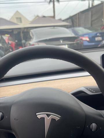 used 2022 Tesla Model 3 car, priced at $21,999