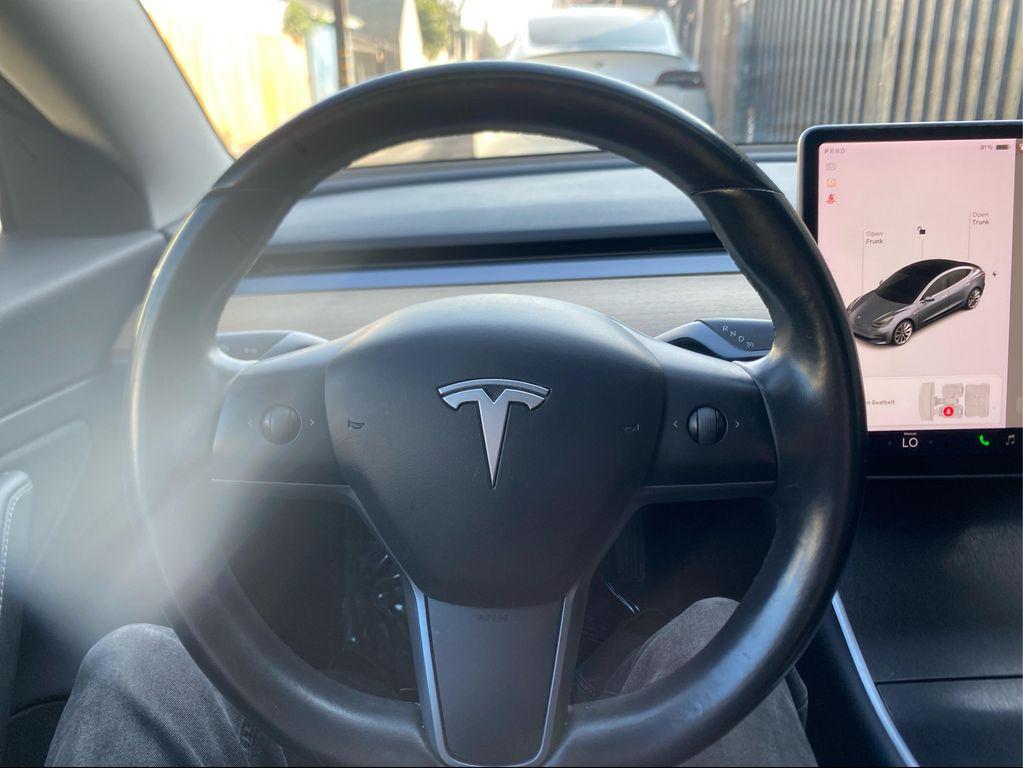 used 2018 Tesla Model 3 car, priced at $18,999