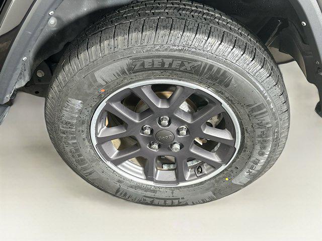 used 2021 Jeep Wrangler Unlimited car, priced at $27,897