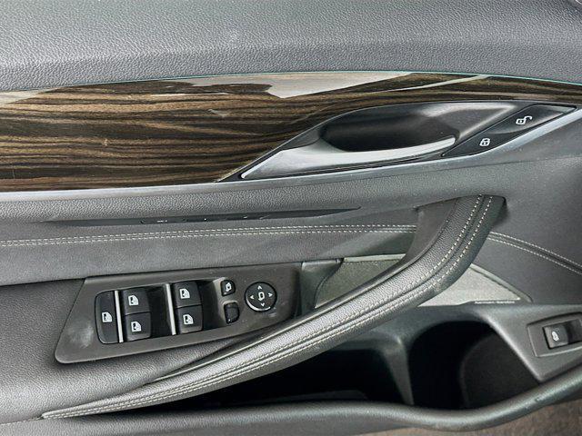 used 2023 BMW 530e car, priced at $30,897