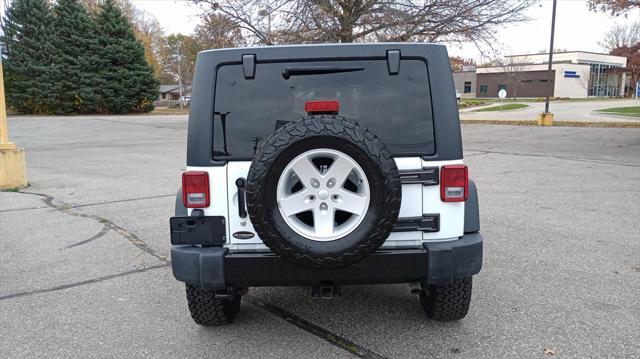 used 2018 Jeep Wrangler JK Unlimited car, priced at $24,990