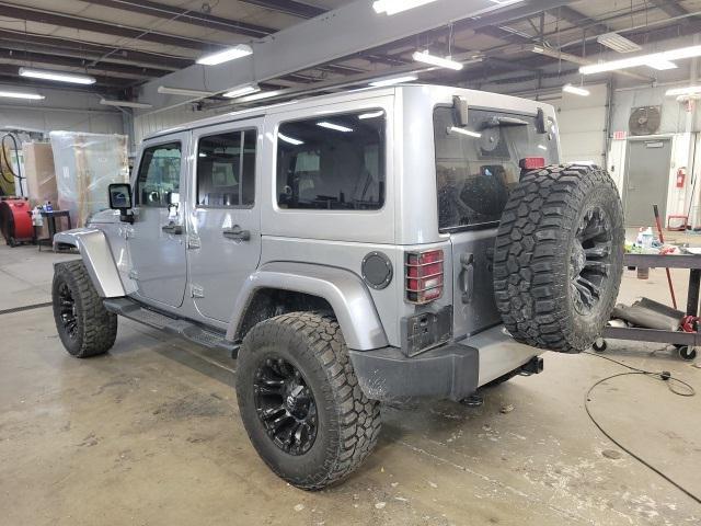 used 2015 Jeep Wrangler Unlimited car, priced at $21,453