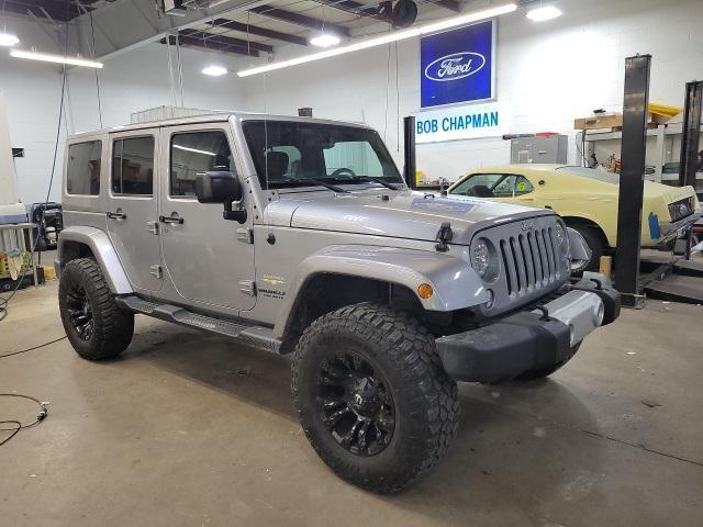 used 2015 Jeep Wrangler Unlimited car, priced at $21,453