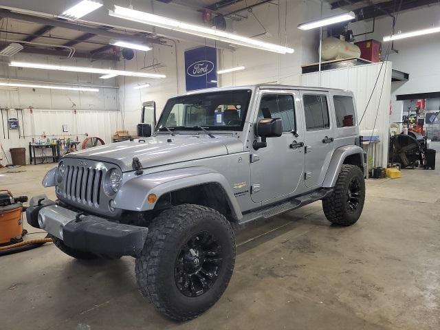 used 2015 Jeep Wrangler Unlimited car, priced at $21,453