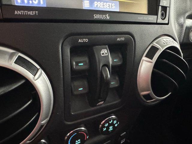 used 2015 Jeep Wrangler Unlimited car, priced at $15,694