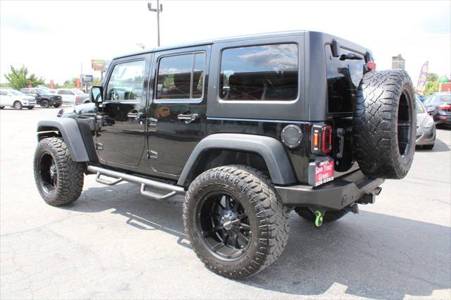 used 2011 Jeep Wrangler Unlimited car, priced at $17,995