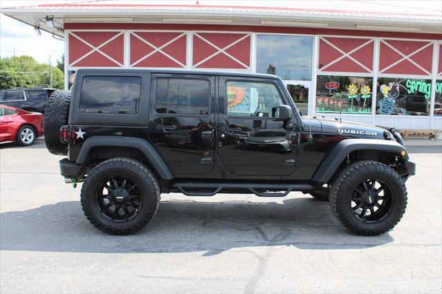 used 2011 Jeep Wrangler Unlimited car, priced at $17,995