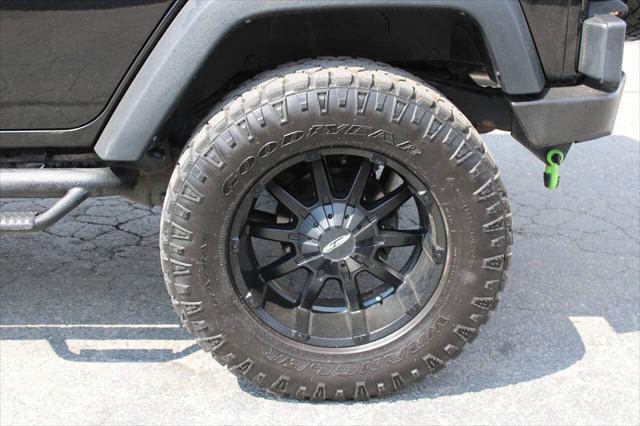used 2011 Jeep Wrangler Unlimited car, priced at $17,995