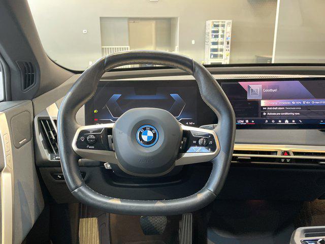 used 2024 BMW iX car, priced at $49,953