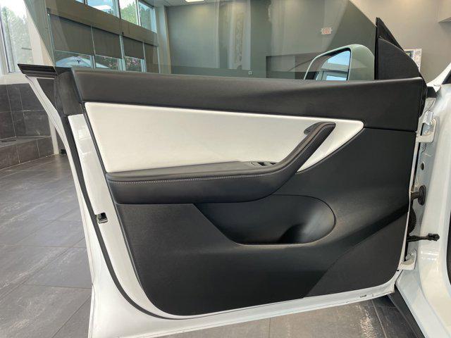 used 2022 Tesla Model Y car, priced at $29,929