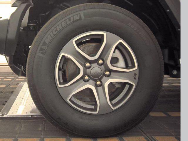 used 2023 Jeep Wrangler car, priced at $32,986