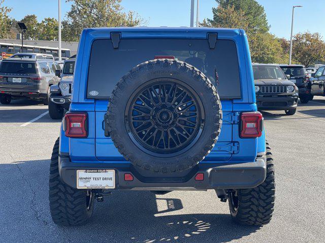 used 2021 Jeep Wrangler Unlimited car, priced at $39,681