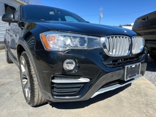 used 2018 BMW X4 car, priced at $17,499