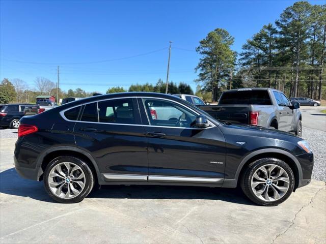 used 2018 BMW X4 car, priced at $17,499