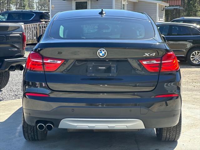 used 2018 BMW X4 car, priced at $17,499