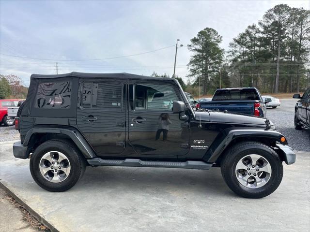 used 2016 Jeep Wrangler Unlimited car, priced at $16,999