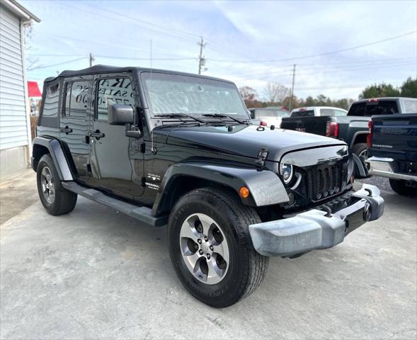 used 2016 Jeep Wrangler Unlimited car, priced at $16,999