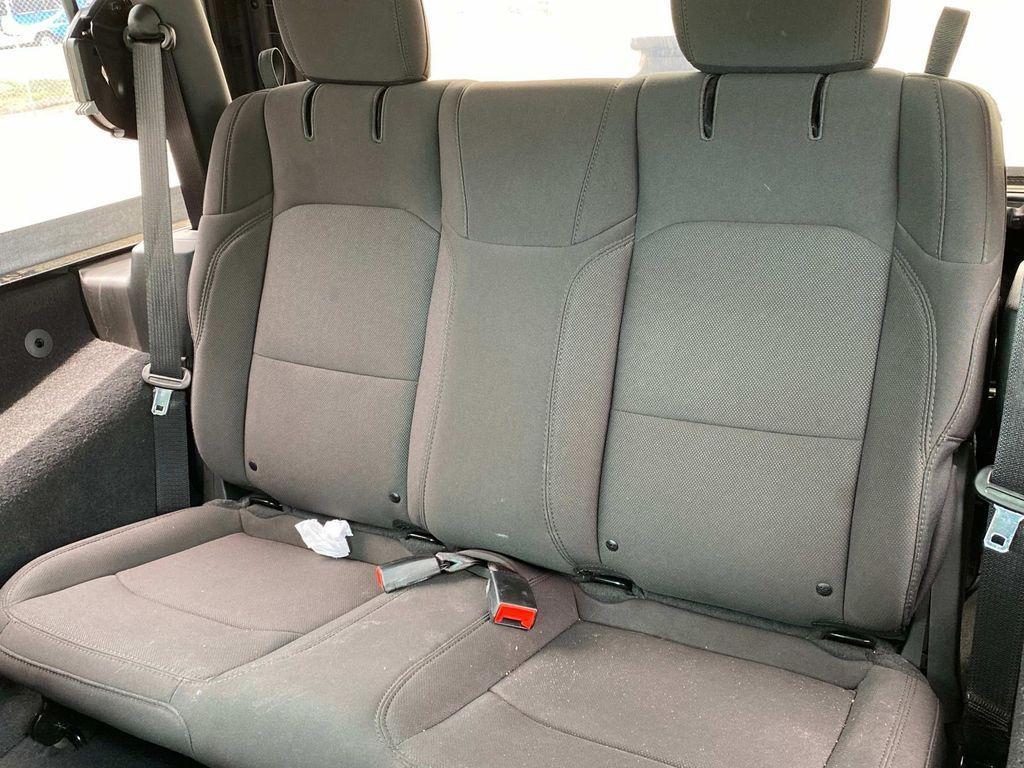used 2023 Jeep Wrangler car, priced at $25,000