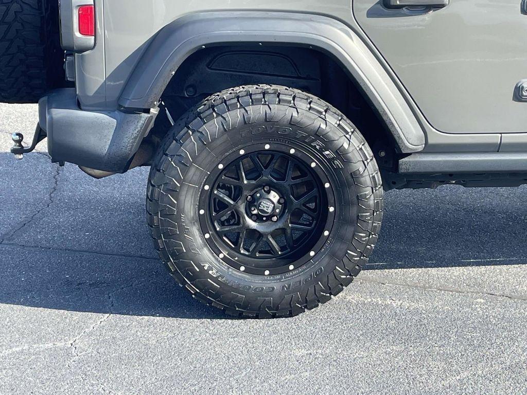used 2021 Jeep Wrangler Unlimited car, priced at $27,697