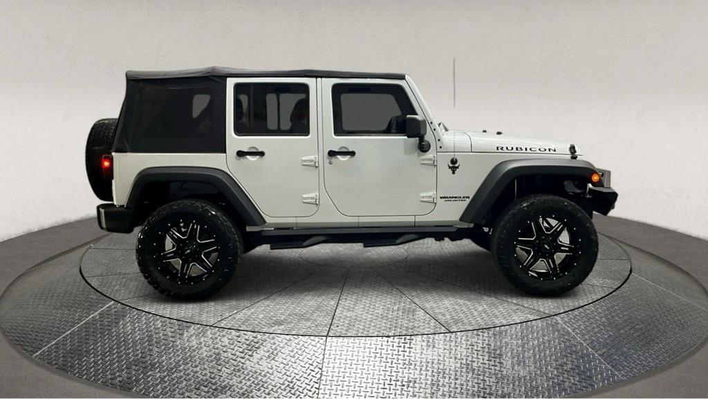 used 2012 Jeep Wrangler Unlimited car, priced at $17,995