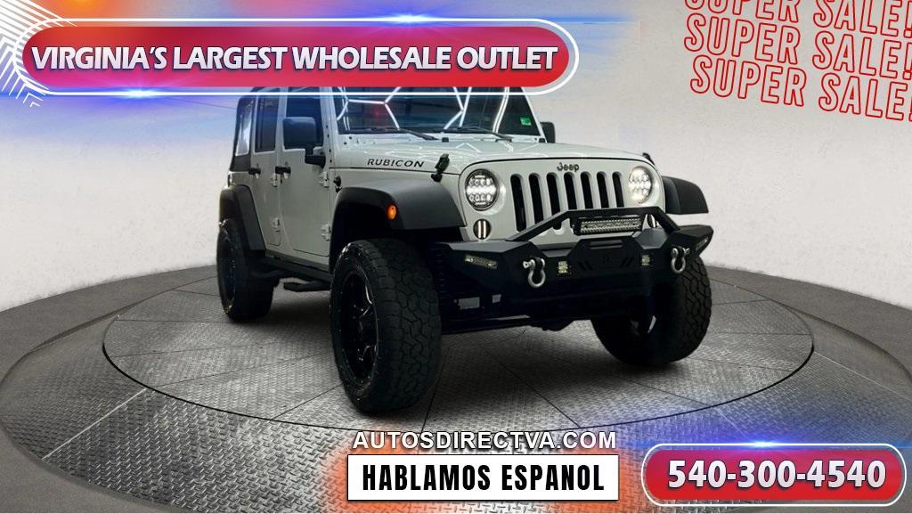 used 2012 Jeep Wrangler Unlimited car, priced at $17,995
