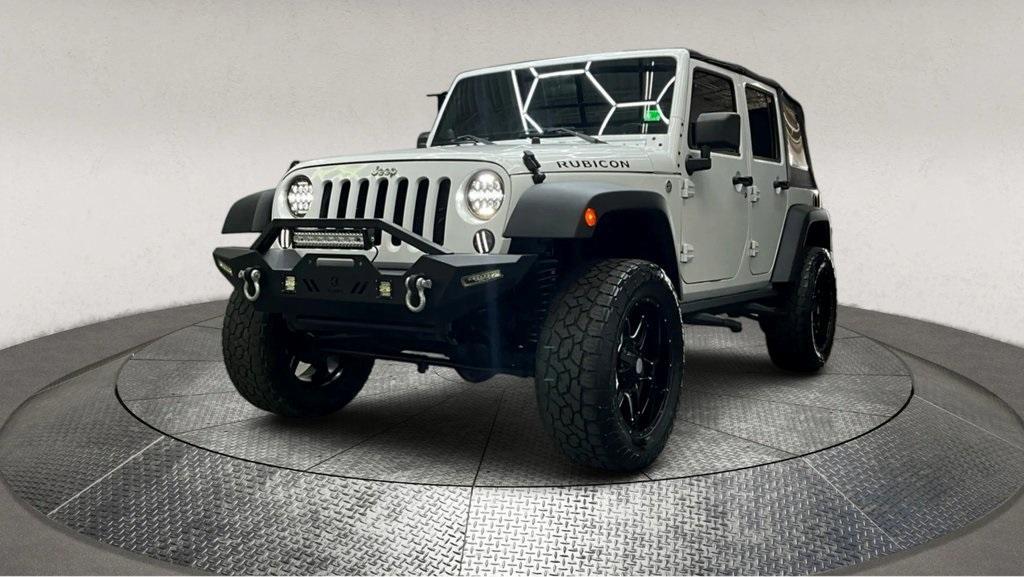 used 2012 Jeep Wrangler Unlimited car, priced at $17,995