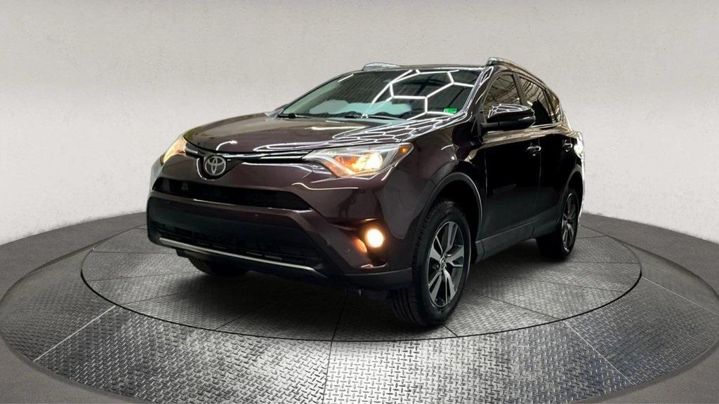 used 2018 Toyota RAV4 car, priced at $17,995