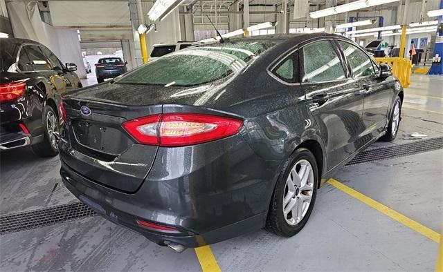 used 2016 Ford Fusion car, priced at $11,995