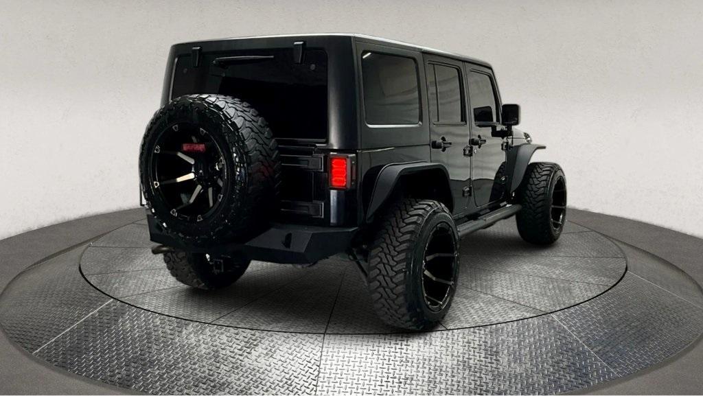 used 2015 Jeep Wrangler Unlimited car, priced at $15,995