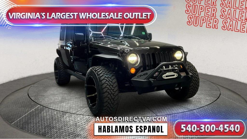 used 2015 Jeep Wrangler Unlimited car, priced at $21,995