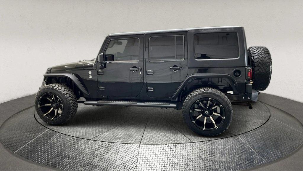 used 2015 Jeep Wrangler Unlimited car, priced at $15,995