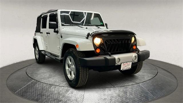 used 2013 Jeep Wrangler Unlimited car, priced at $17,495