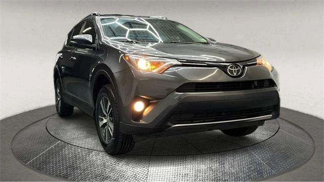 used 2018 Toyota RAV4 car, priced at $17,795