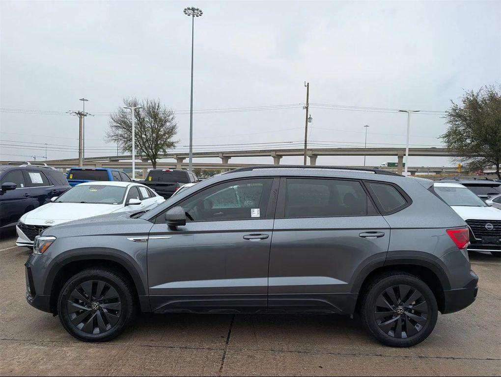 used 2023 Volkswagen Taos car, priced at $16,700
