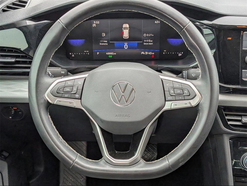 used 2023 Volkswagen Taos car, priced at $16,700