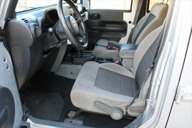 used 2009 Jeep Wrangler Unlimited car, priced at $13,600