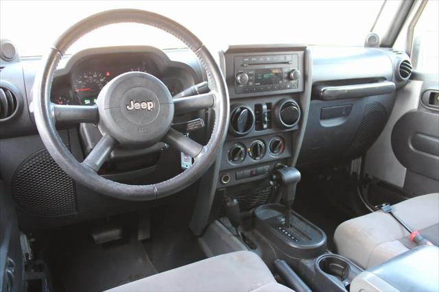 used 2009 Jeep Wrangler Unlimited car, priced at $13,600