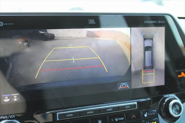 used 2021 Toyota Highlander Hybrid car, priced at $31,999
