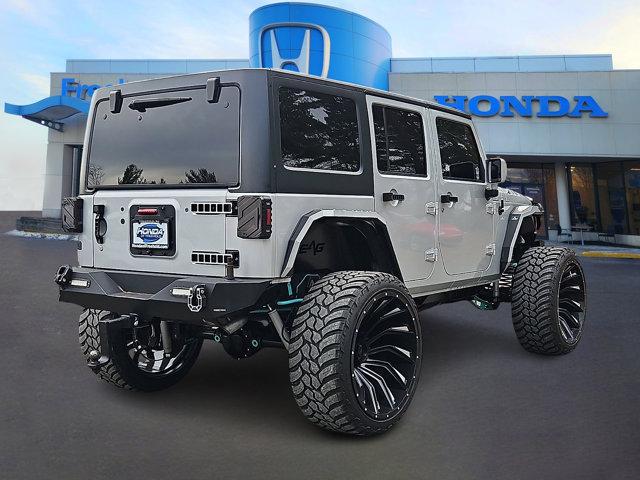 used 2012 Jeep Wrangler Unlimited car, priced at $16,982
