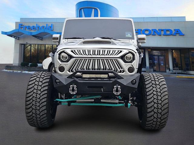 used 2012 Jeep Wrangler Unlimited car, priced at $16,982