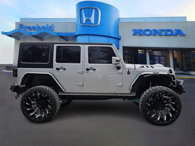 used 2012 Jeep Wrangler Unlimited car, priced at $16,982