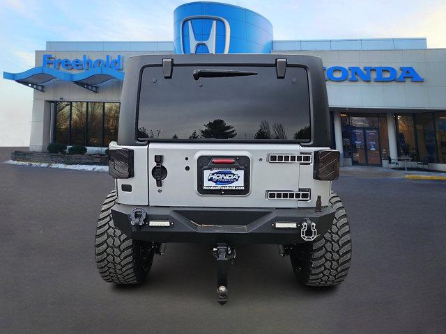 used 2012 Jeep Wrangler Unlimited car, priced at $16,982