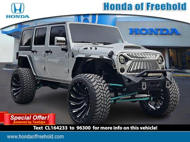 used 2012 Jeep Wrangler Unlimited car, priced at $16,982