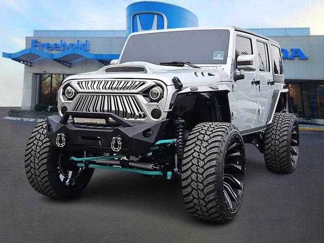 used 2012 Jeep Wrangler Unlimited car, priced at $16,982