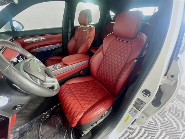 used 2023 Genesis GV70 car, priced at $36,350