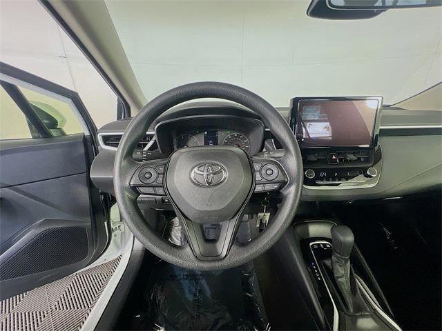 used 2025 Toyota Corolla Hybrid car, priced at $20,991