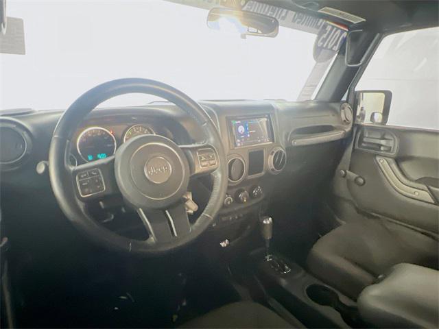 used 2015 Jeep Wrangler Unlimited car, priced at $18,391