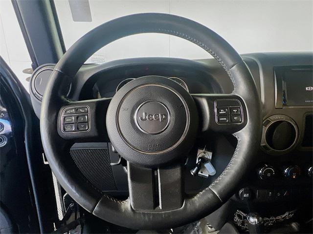 used 2015 Jeep Wrangler Unlimited car, priced at $18,391